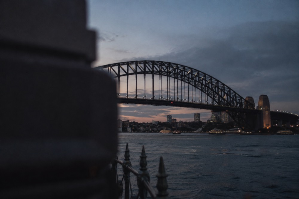A ladder and steel catwalk on the lower arch of Sydney Harbour Bridge seen from below