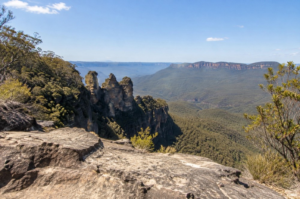Sandstone cliffs and forested valleys of the Blue Mountains seen from a Katoomba lookout