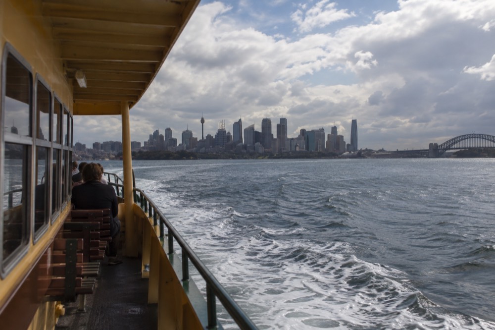 Ferry crossing Sydney Harbour towards Manly with the city behind