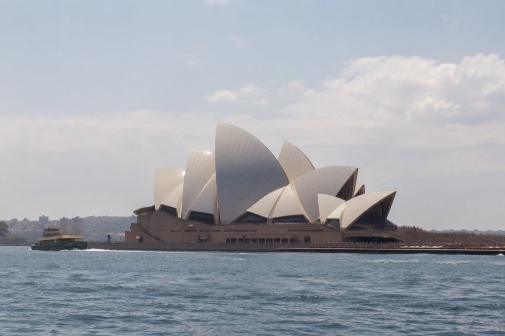 Close view of the white tiled roof shells of the Sydney Opera House