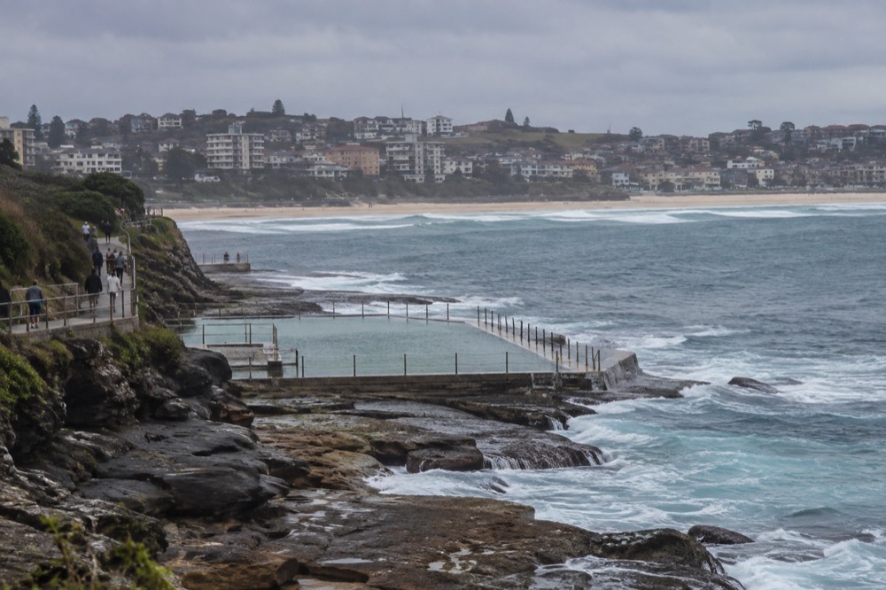 Ocean pool and headland path along the Bondi to Coogee coastal walk in afternoon light