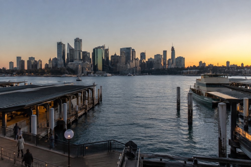 The Sydney city skyline on a clear winter morning seen across the harbour