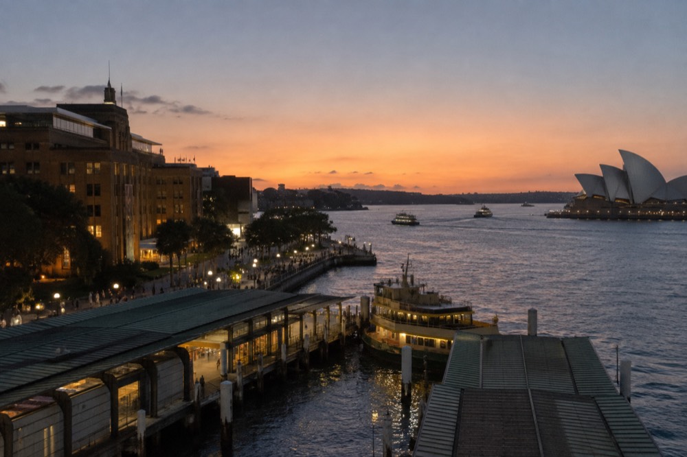 View across Sydney Cove from the harbour with heritage buildings in the foreground