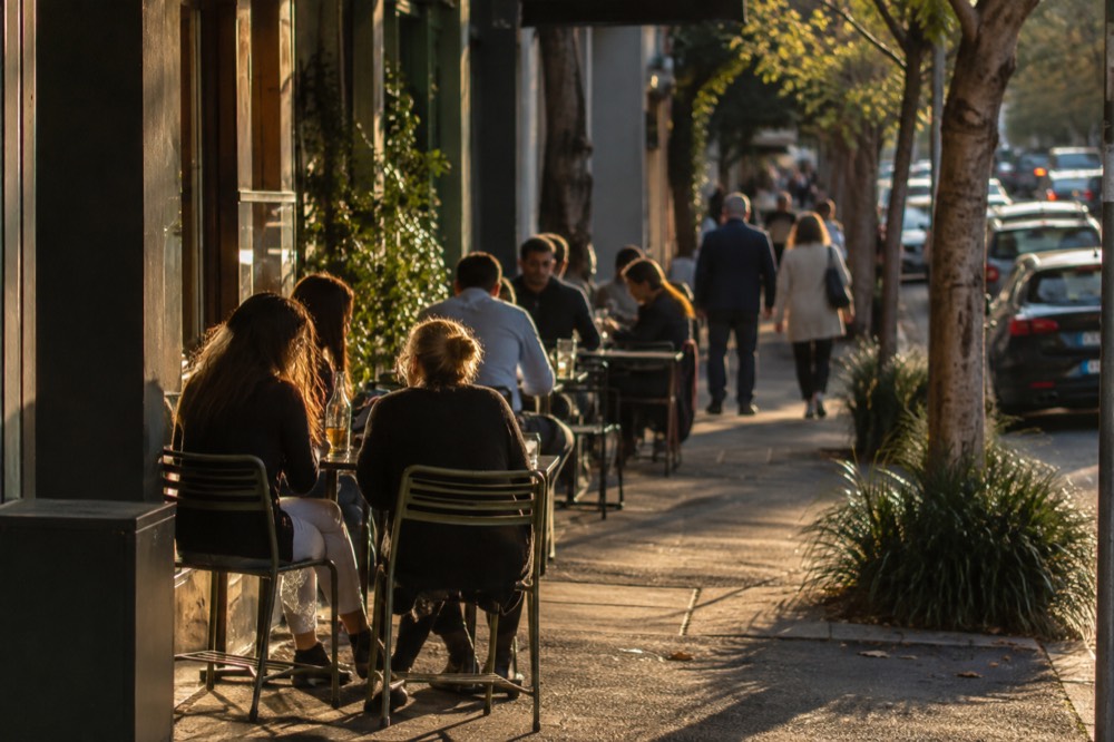 Cafe tables set on the footpath outside a Darlinghurst eatery