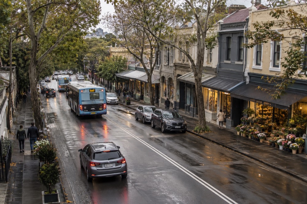 Buses and shopfronts along Oxford Street in Paddington