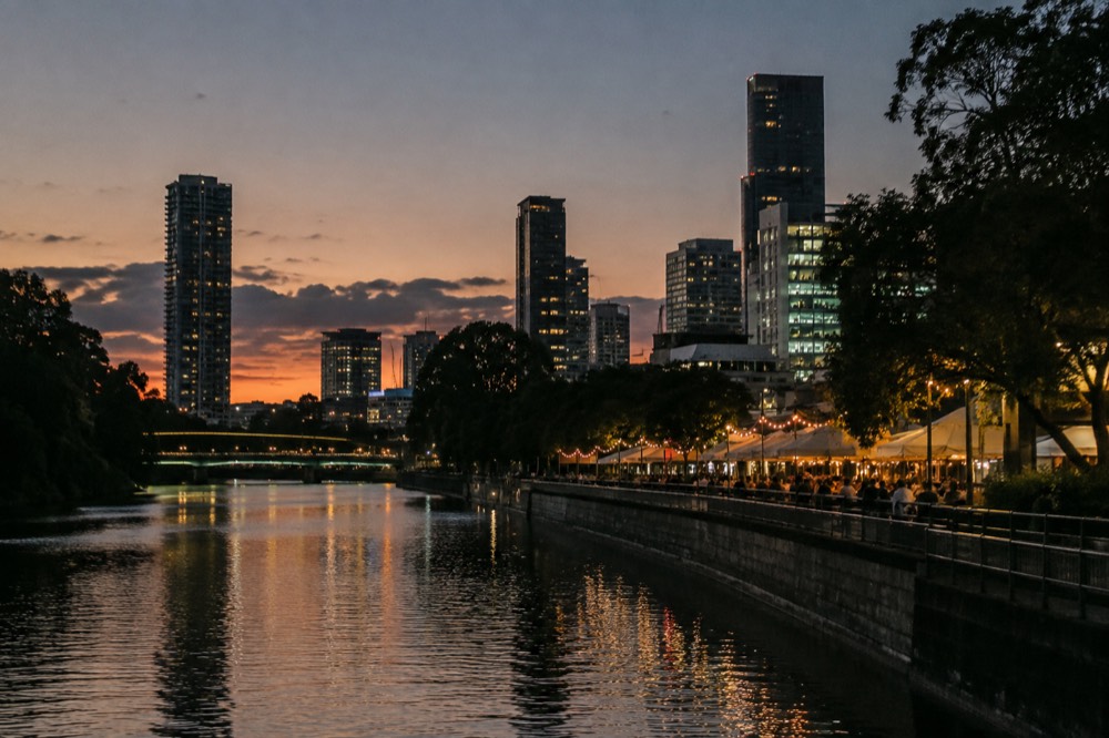 Evening view over Parramatta with lit restaurants and office towers at dusk