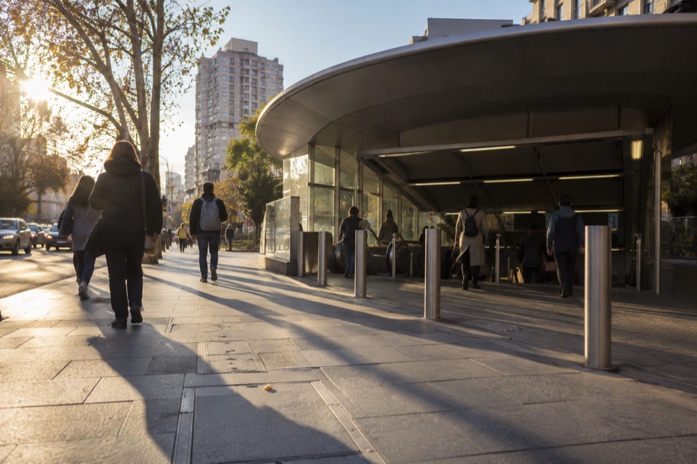 Kings Cross station entrance with commuters on Darlinghurst Road