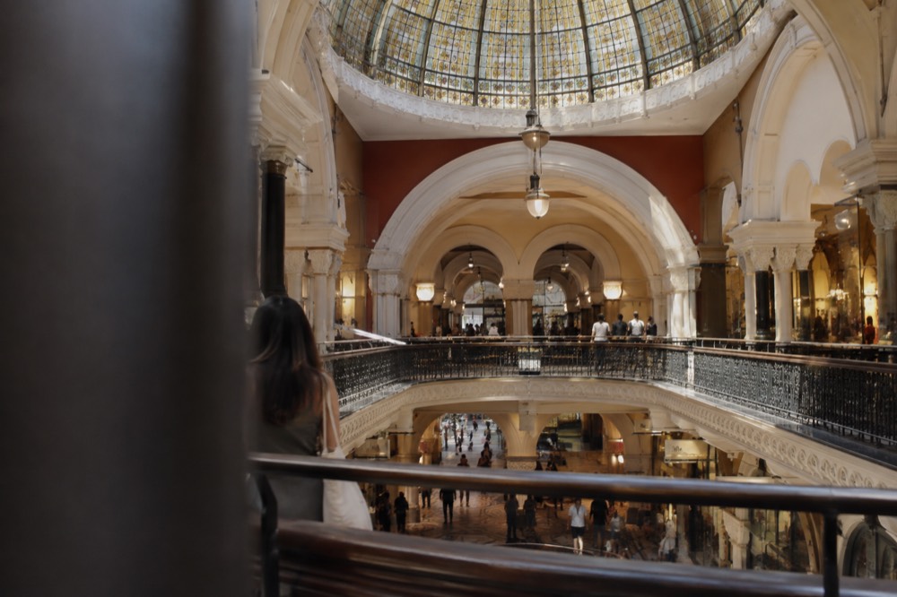 Queen Victoria Building interior with stained glass dome and balconies