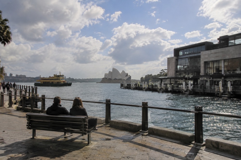 Ferry wharves and a gallery building seen across a harbour cove
