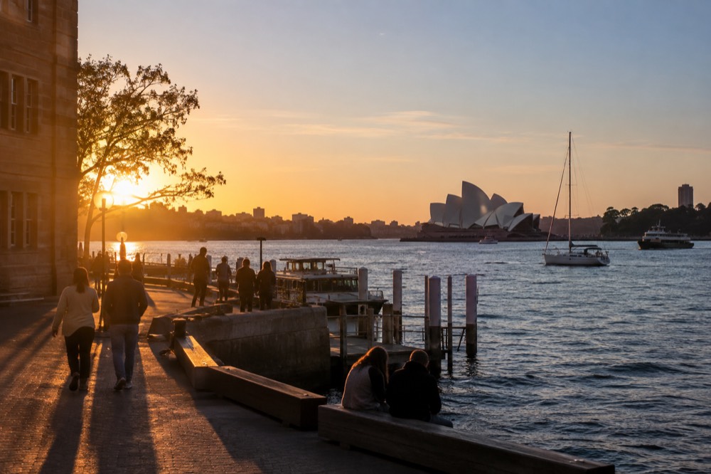 Harbour foreshore under a clear sky with moored boats