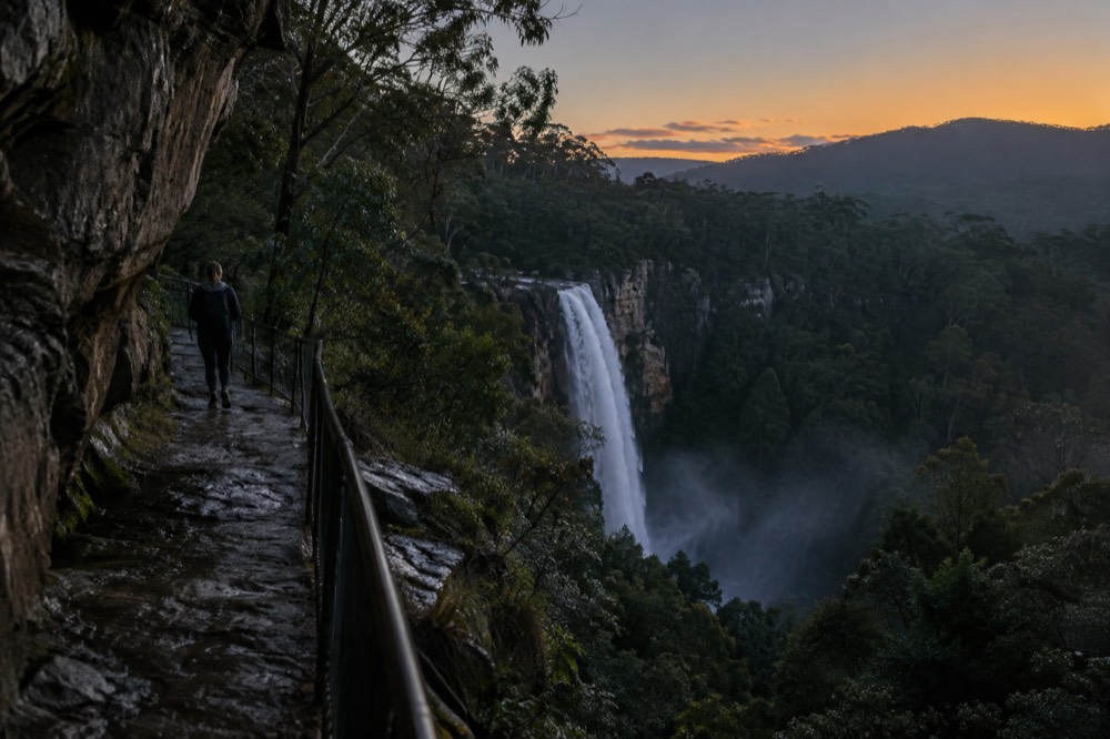 A plume of water falling into a rainforest gorge at a Southern Highlands waterfall