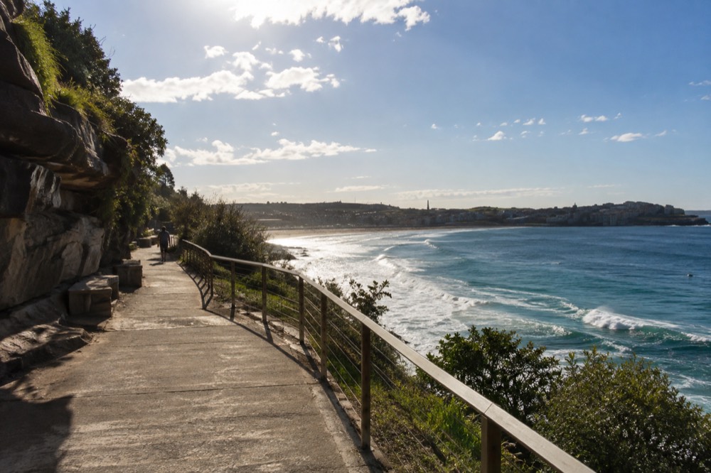 Empty coastal path above Bondi Beach on a bright winter morning