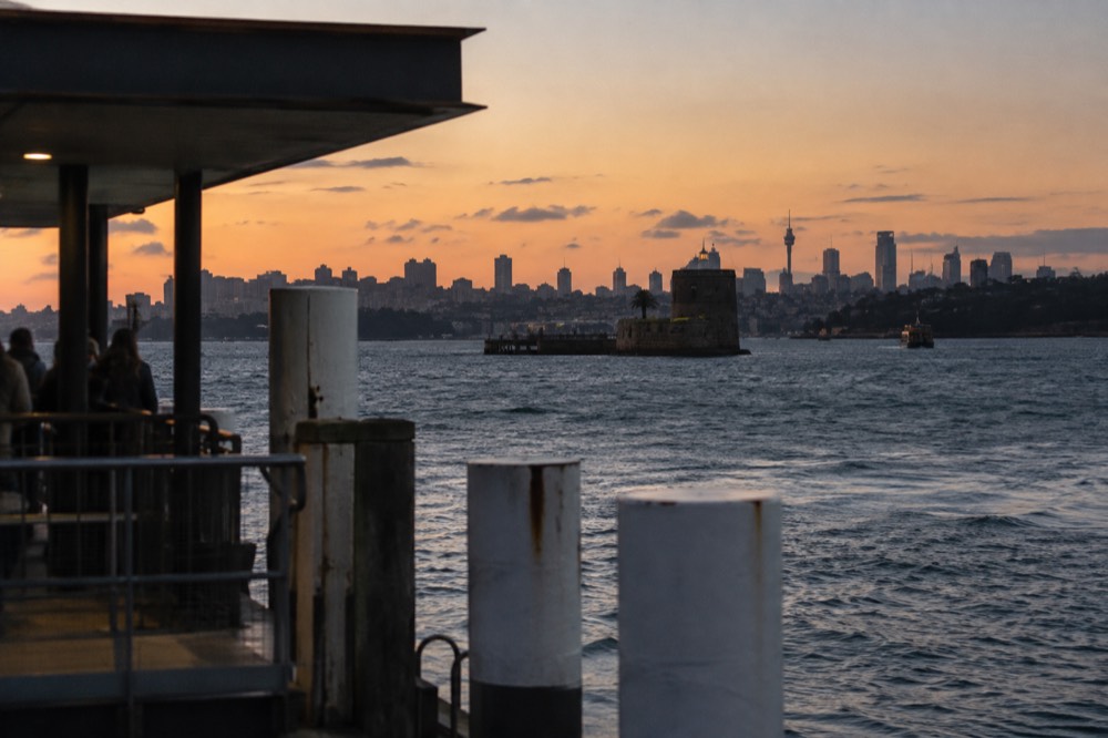 Fort Denison island in Sydney Harbour with the city skyline behind