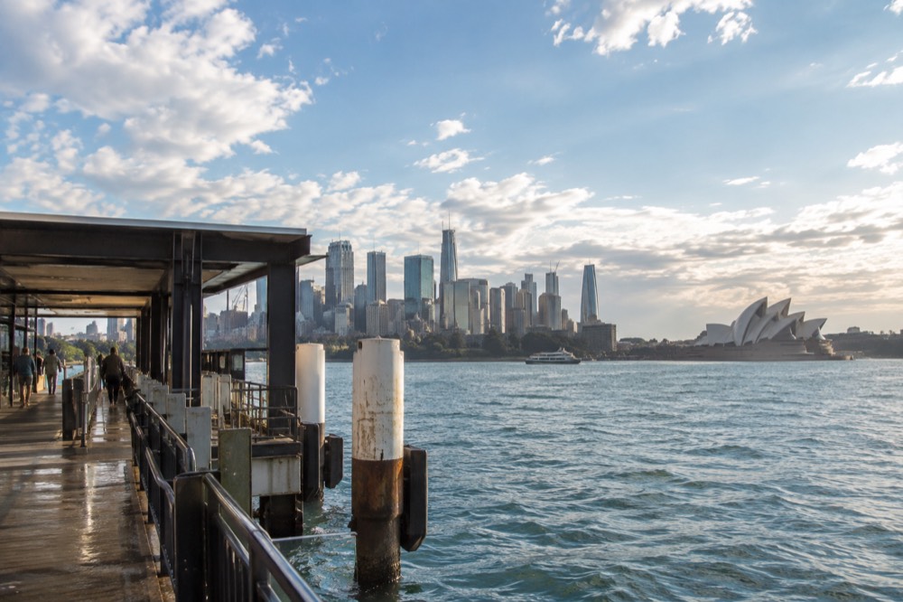 Sydney city skyline and harbour seen from high above at late afternoon