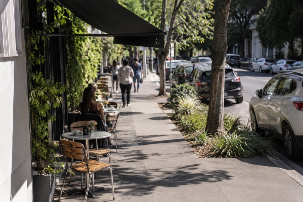 Café tables on a sunny street in Surry Hills