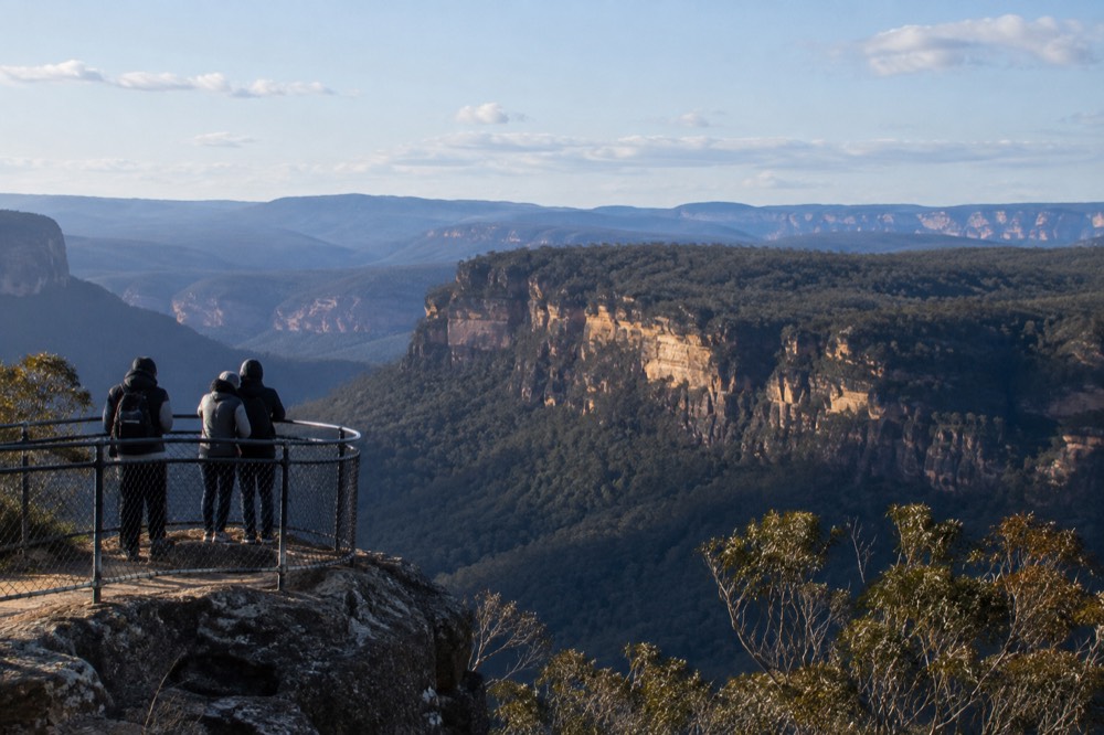 Sandstone cliffs and forested valley at Katoomba under a wide sky